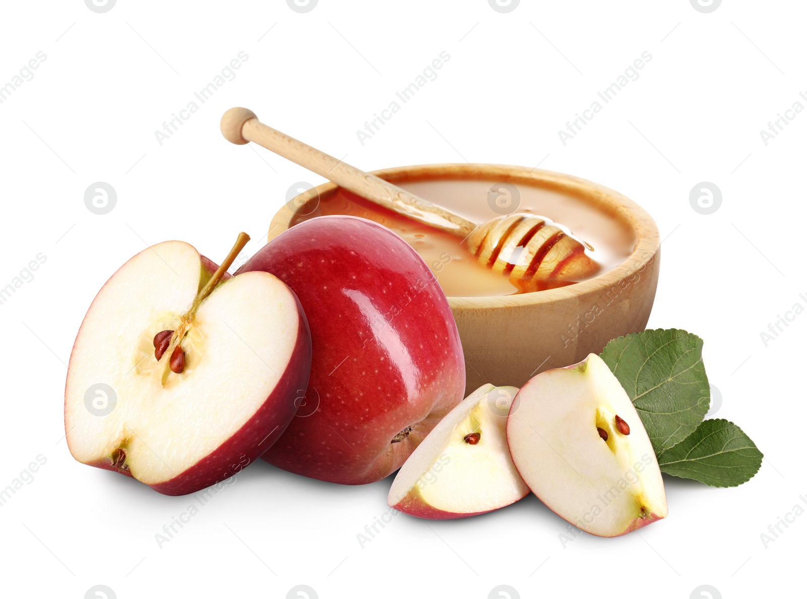 Image of Honey in bowl and apples isolated on white