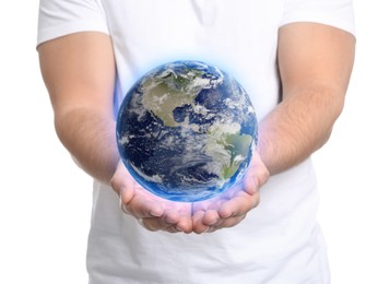 Image of World in our hands. Man holding digital model of Earth on white background, closeup view 