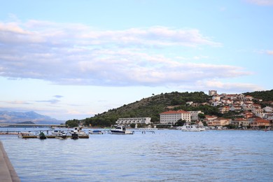 Photo of Picturesque view of town, mountains and sea