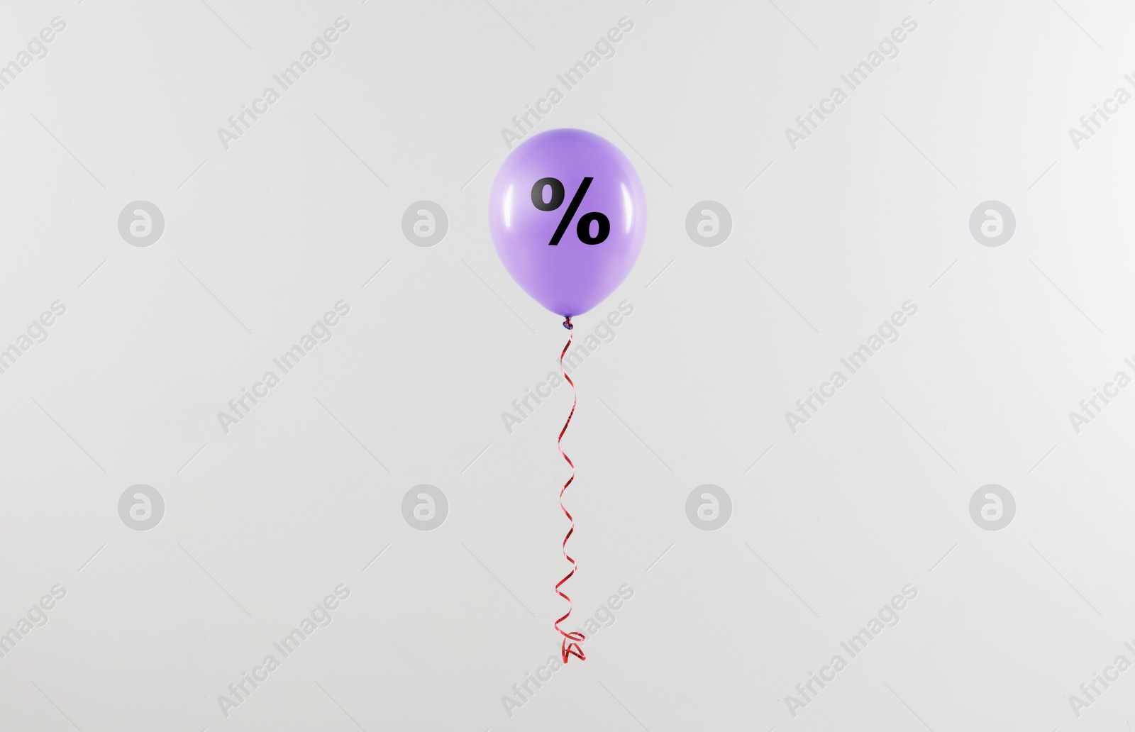 Image of Discount offer. Violet balloon with percent sign on white background
