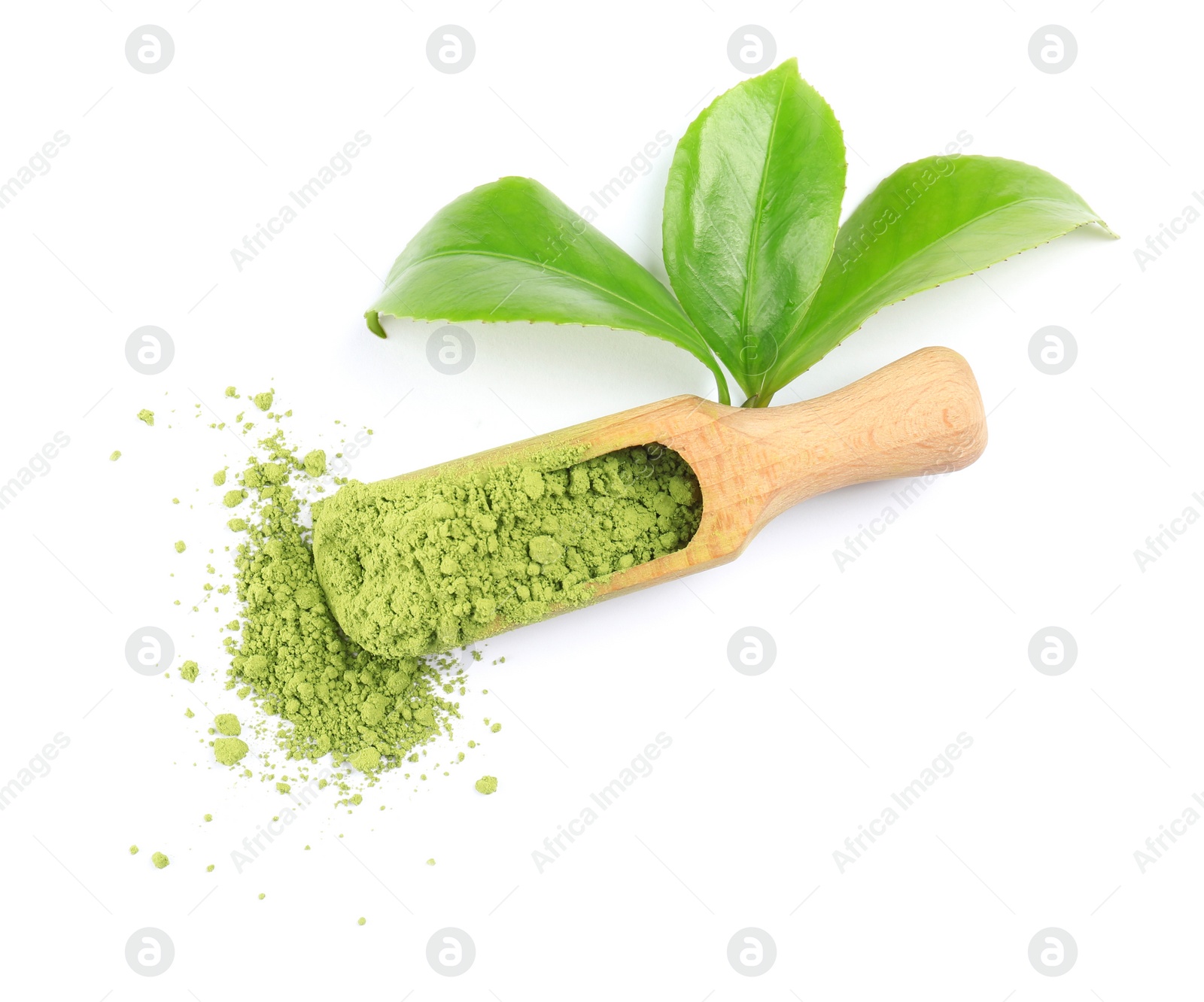 Photo of Scoop with powdered matcha tea and green leaves on white background