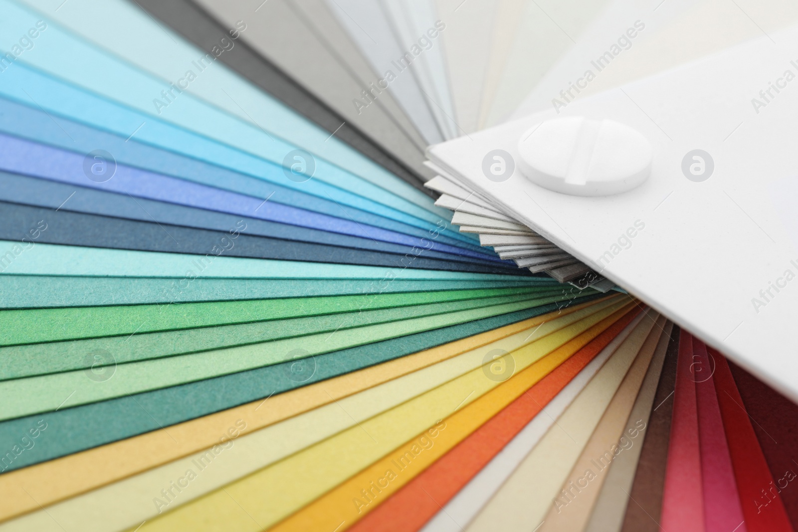 Photo of Color palette samples as background, closeup view