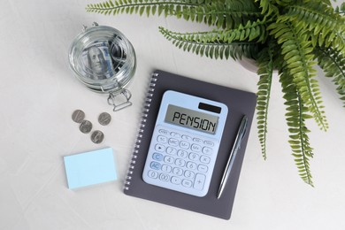 Image of Calculator with word Pension, money, stationery and houseplant on light grey table, flat lay