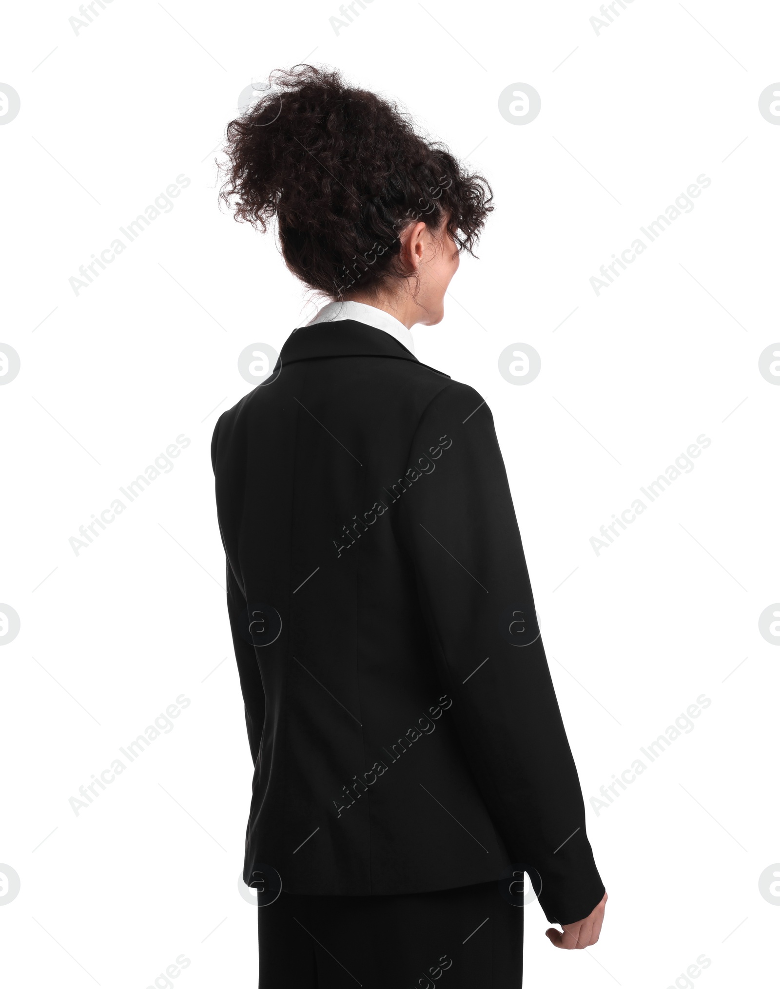 Photo of Young businesswoman in suit standing on white background