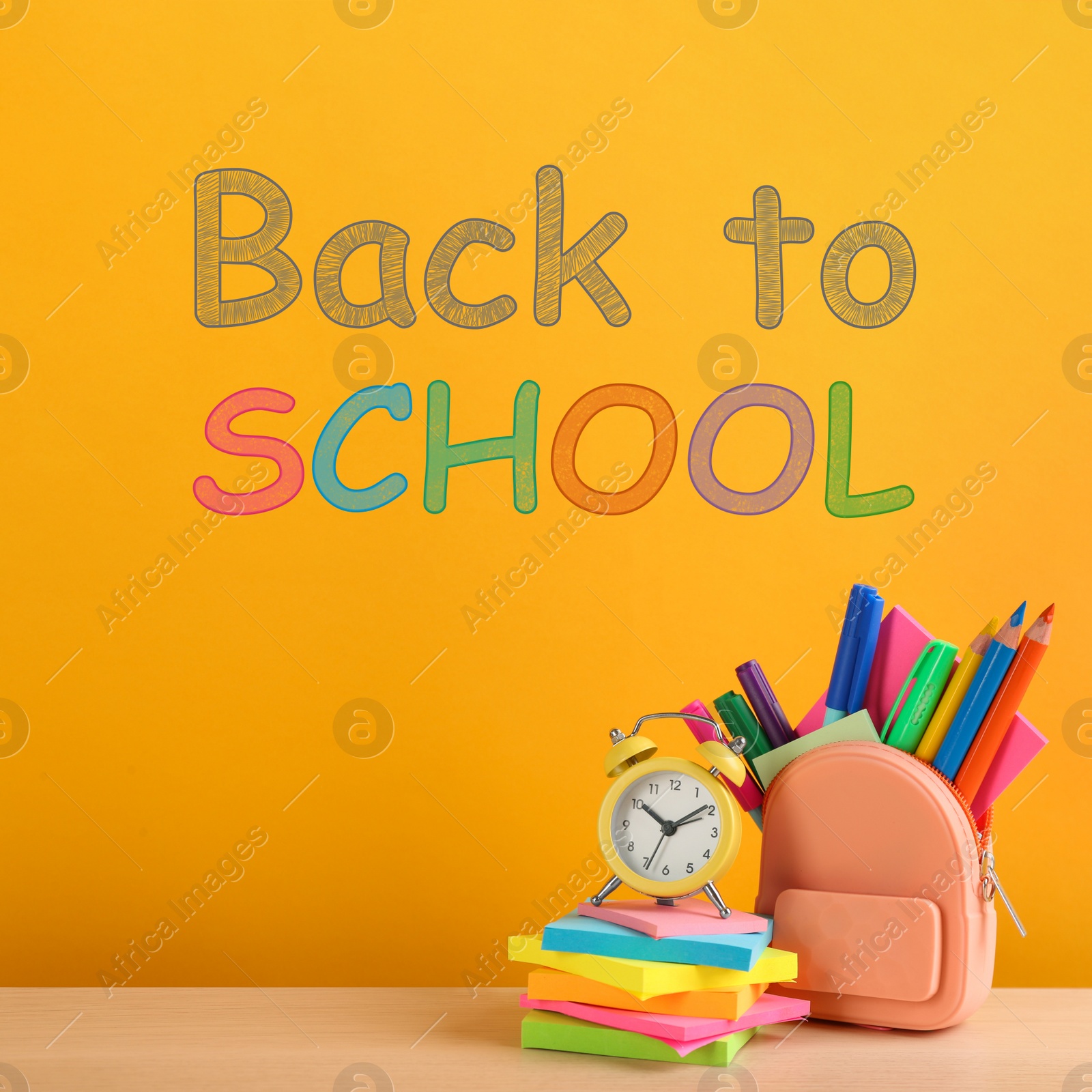 Image of Text Back To School and different stationery on yellow background