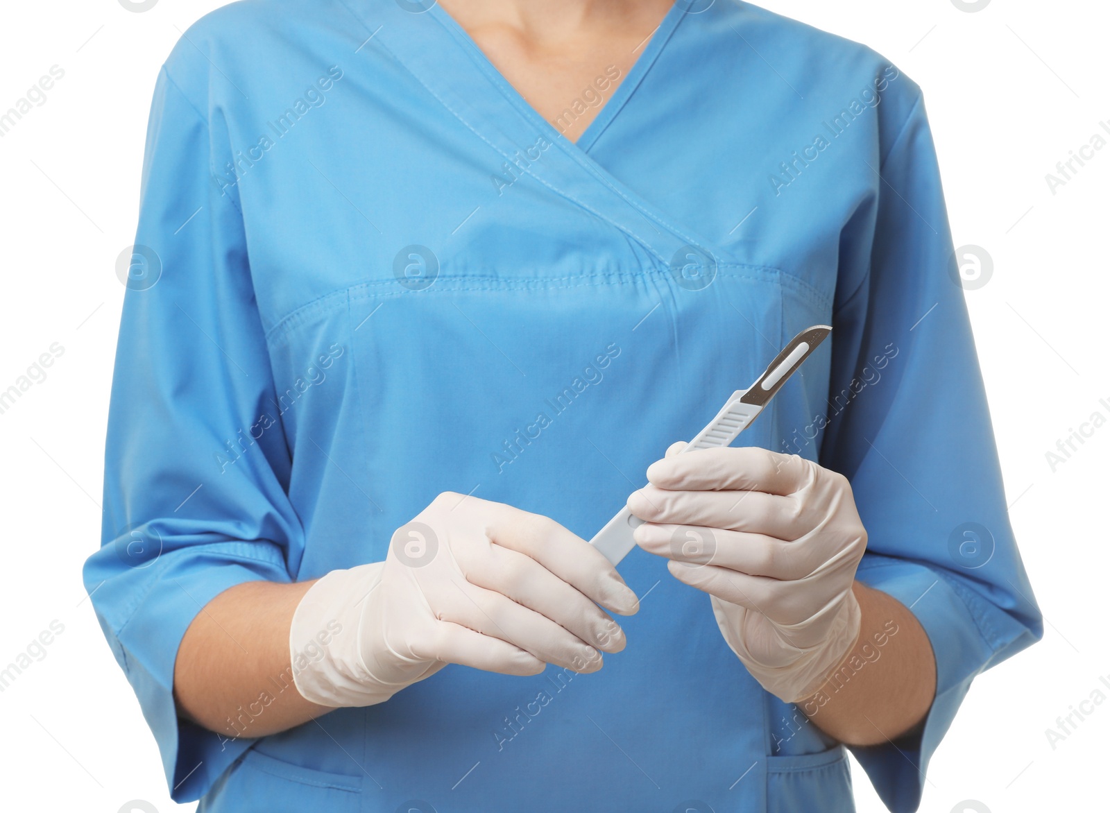 Photo of Female doctor holding scalpel on white background, closeup. Medical object