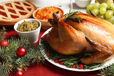 Traditional festive dinner with delicious roasted turkey served on table