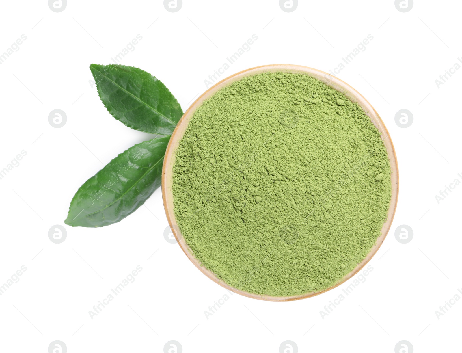 Photo of Leaves and bowl of matcha powder isolated on white, top view