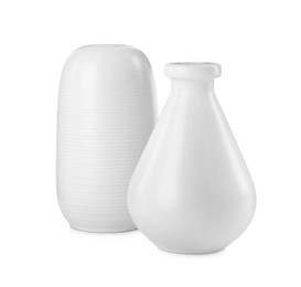 Photo of Stylish empty ceramic vases on white background