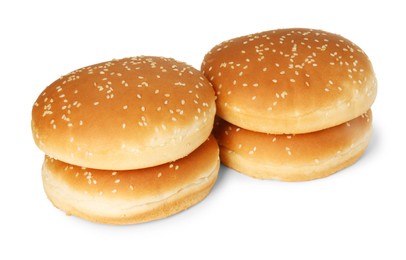 Many fresh hamburger buns isolated on white