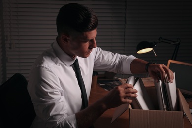 Professional detective doing paperwork in his office