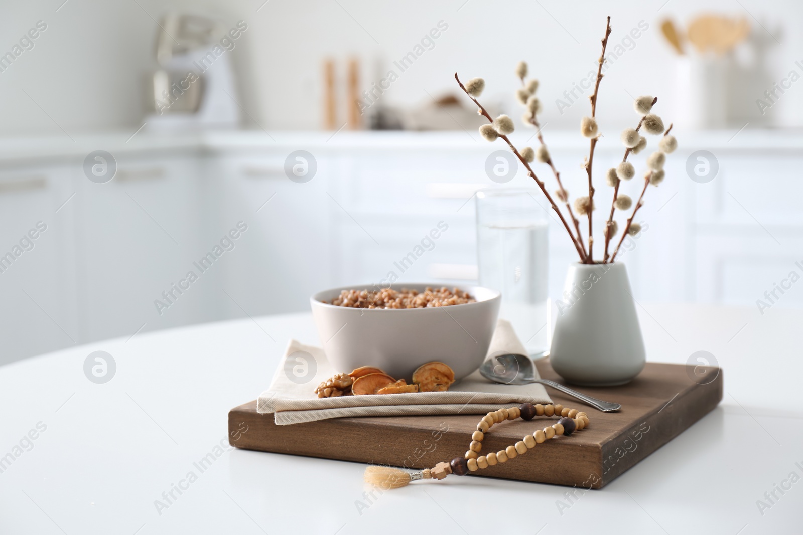 Photo of Great Lent dinner served on white table in kitchen