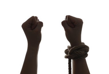 Freedom concept. Woman with rope on her hand against white background, closeup