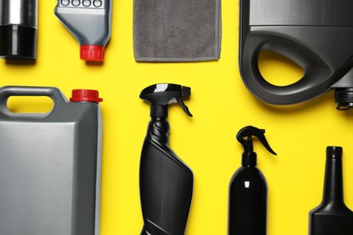 Photo of Different car products on yellow background, flat lay