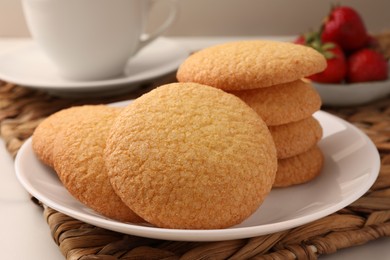 Photo of Delicious Danish butter cookies on table, closeup