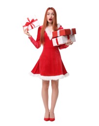 Photo of Emotional young woman in red dress with Christmas gifts on white background
