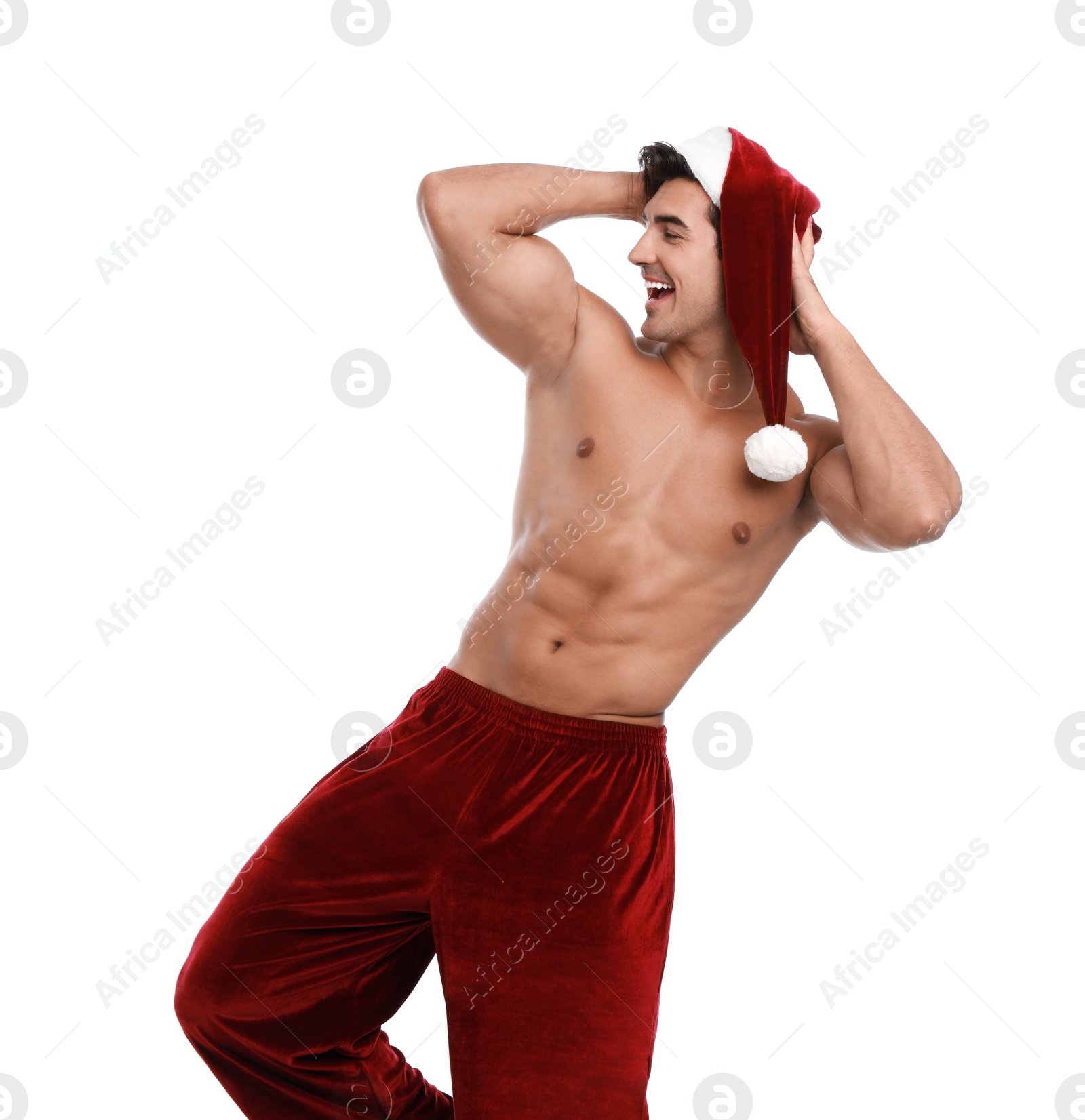 Photo of Sexy shirtless Santa Claus on white background