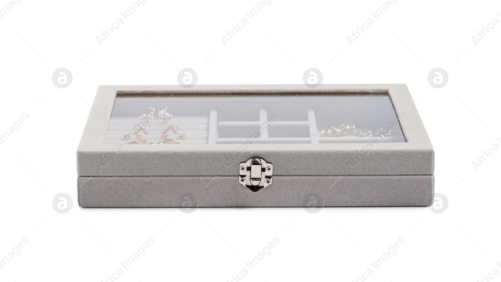 Photo of Jewelry box with many different golden accessories isolated on white