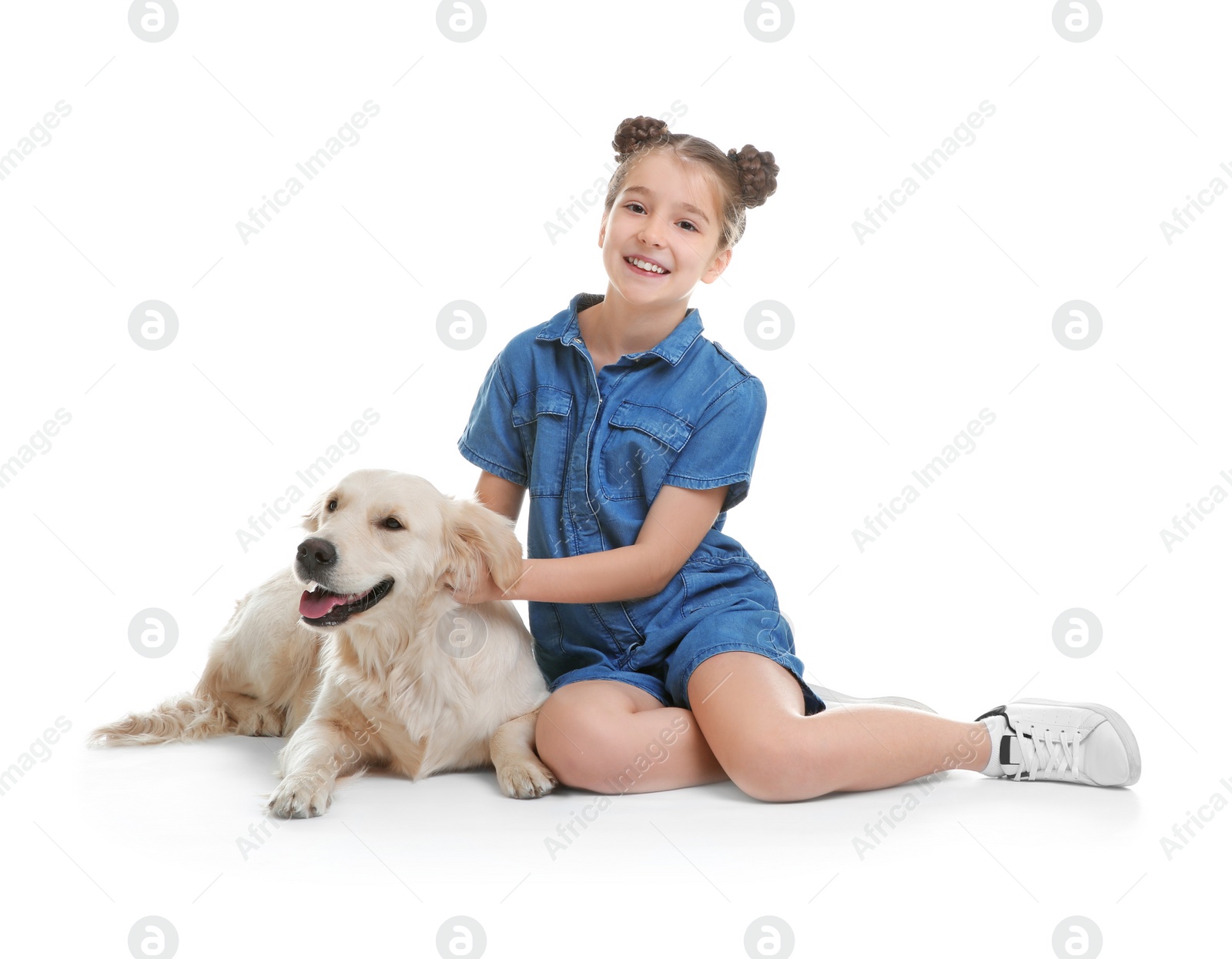 Photo of Cute little child with her pet on white background