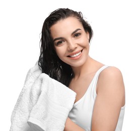 Photo of Happy young woman drying hair with towel after washing on white background