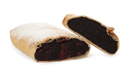 Delicious cut strudel with cherries and poppy seeds isolated on white