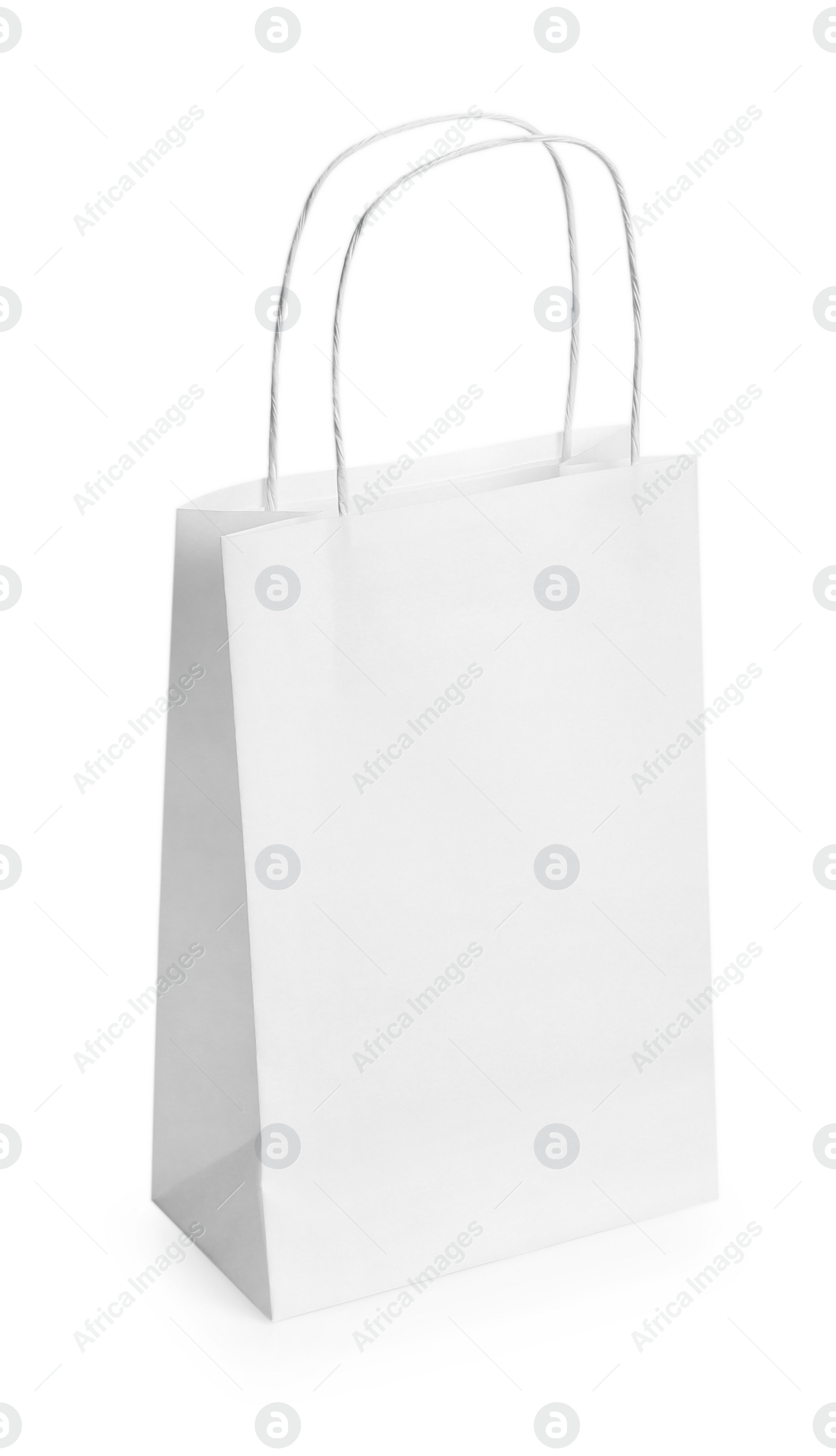 Photo of One paper bag isolated on white. Mockup for design