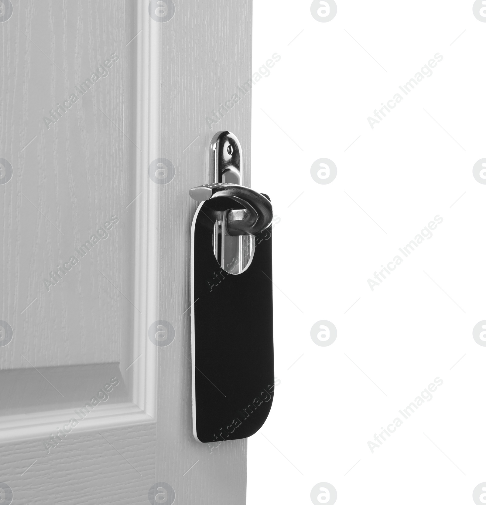 Photo of Hotel wooden door with blank hanger on white background, closeup