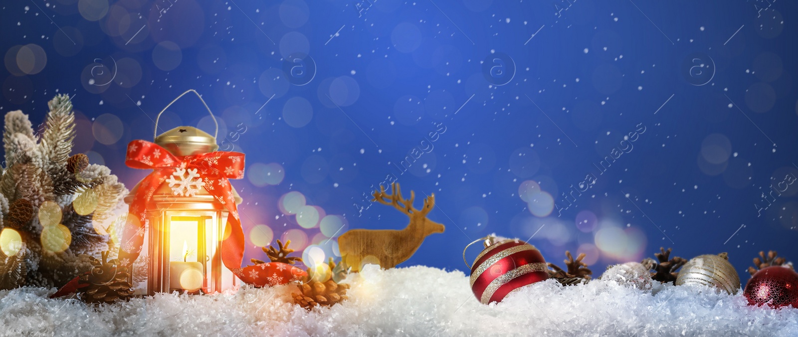 Image of Beautiful composition with vintage Christmas lantern and festive decorations on snow against color background, banner design. Bokeh effect