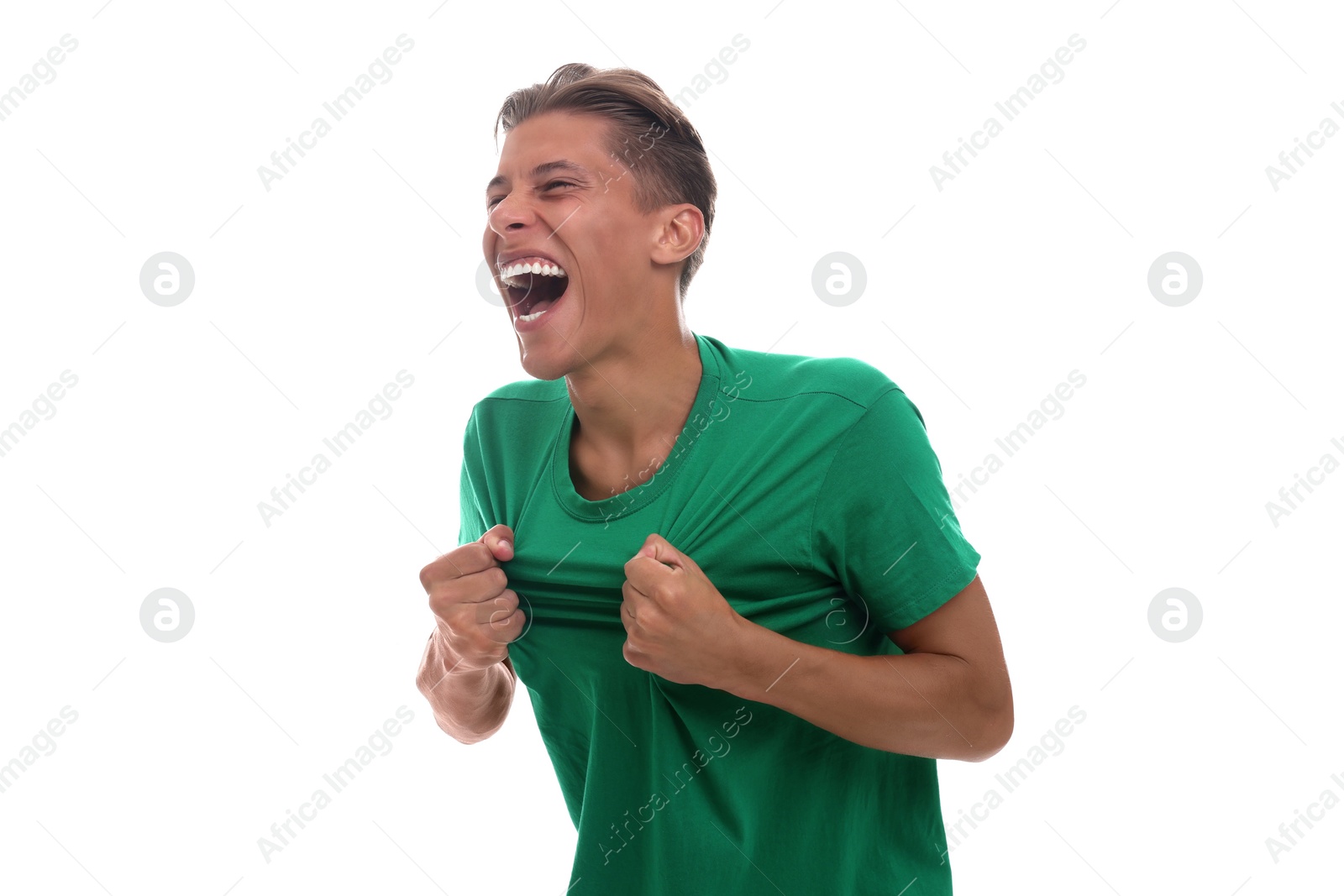 Photo of Emotional sports fan celebrating on white background