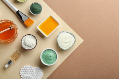 Flat lay composition with spirulina facial mask and ingredients on color background