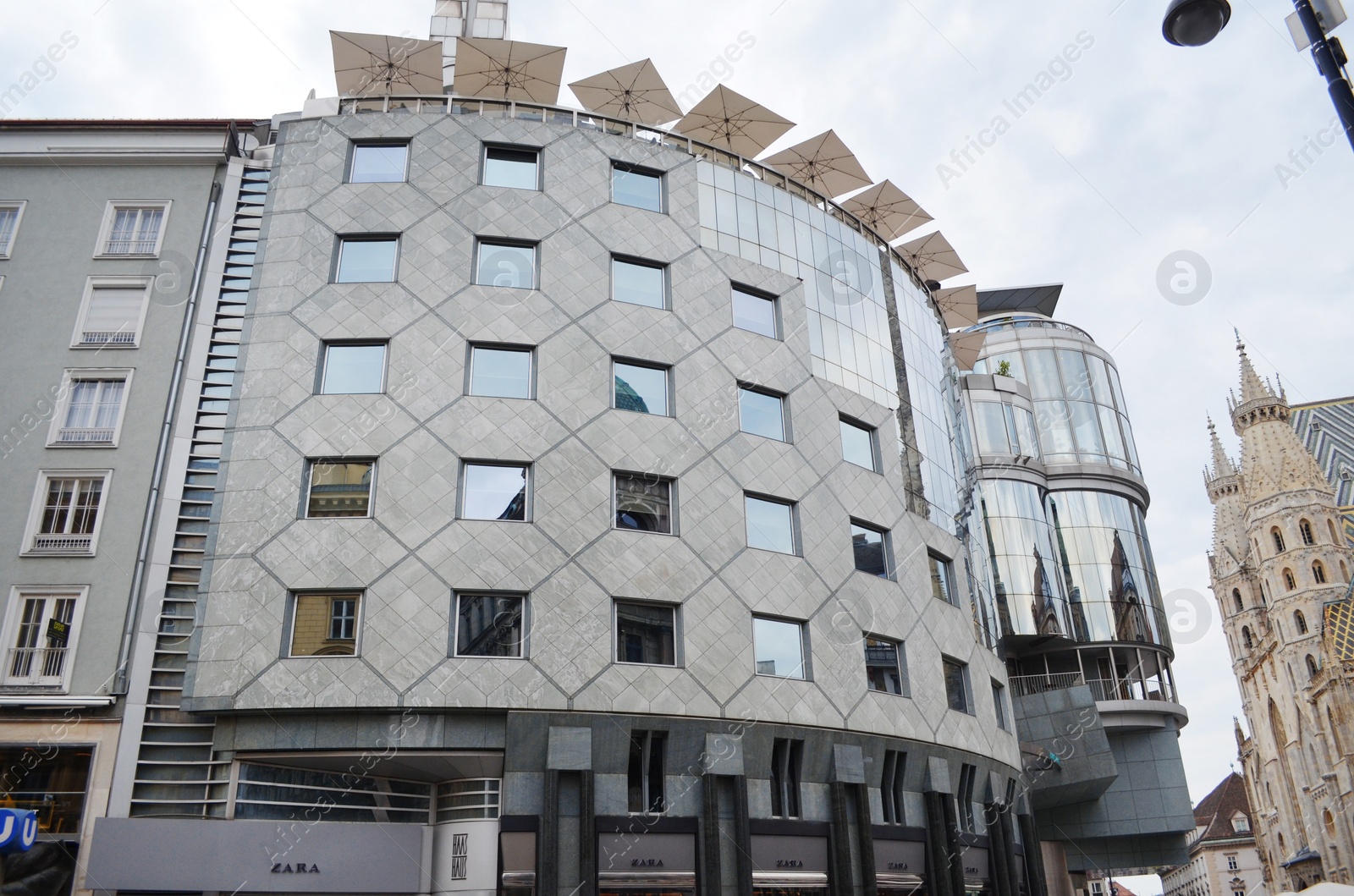 Photo of VIENNA, AUSTRIA - JUNE 17, 2018: Modern building on city street