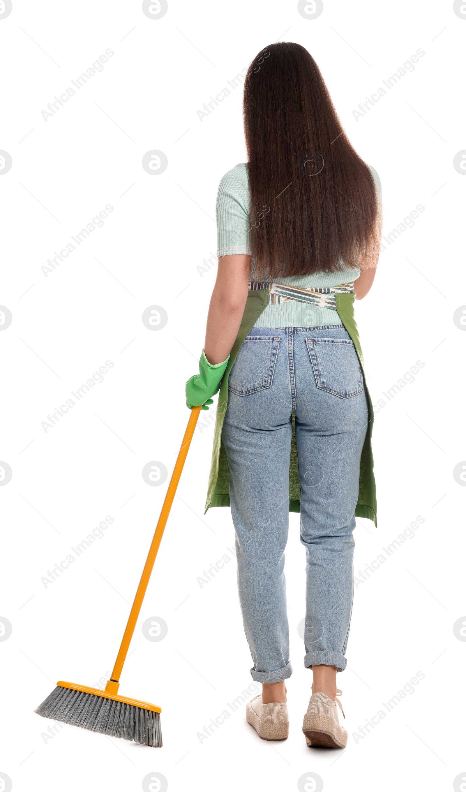 Photo of Beautiful young woman with broom on white background, back view