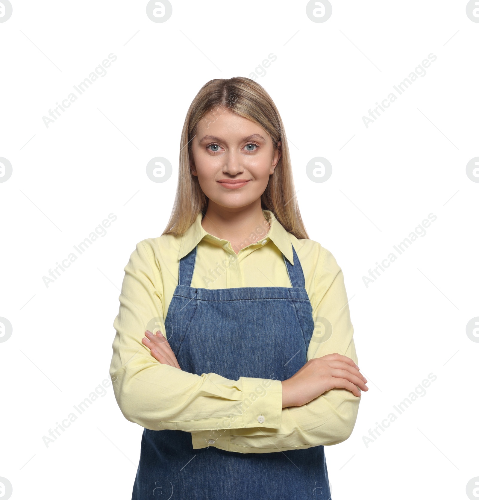 Photo of Beautiful young woman in denim apron on white background