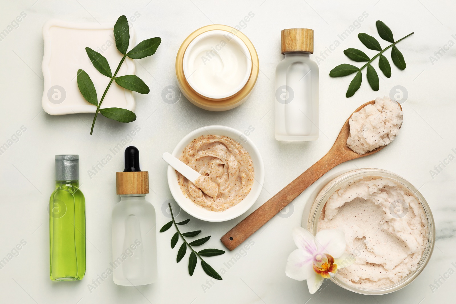 Photo of Flat lay composition with different spa products on white marble table