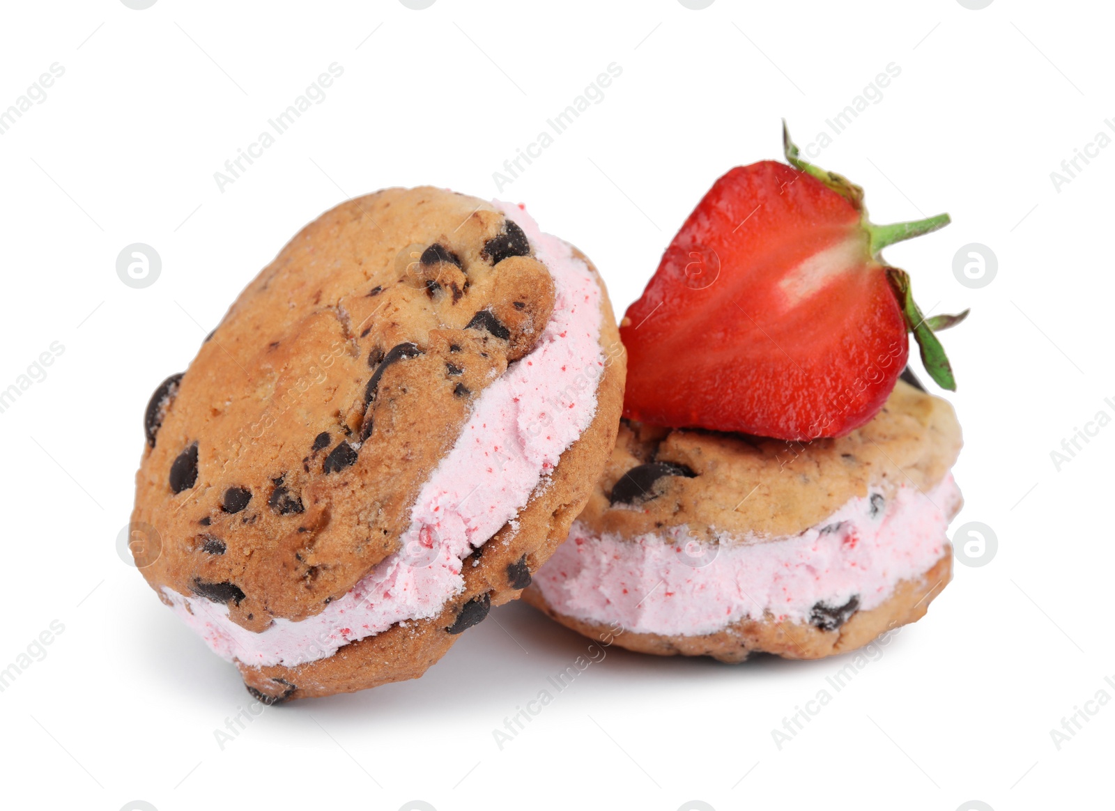 Photo of Sweet delicious ice cream cookie sandwiches and strawberry on white background