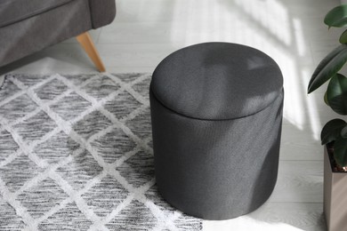 Stylish comfortable ottoman in room. Home design