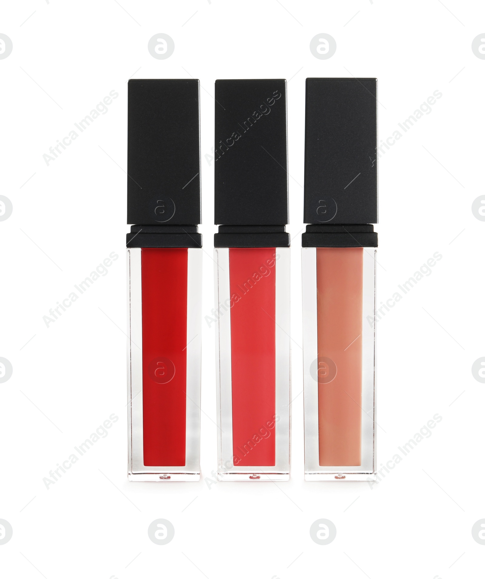Photo of Different colour lipsticks on white background. Cosmetic product