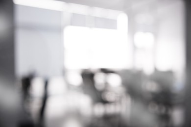 Image of Office interior. Blurred view of comfortable workspace