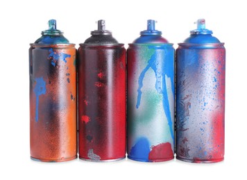 Photo of Many spray paint cans isolated on white