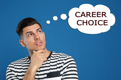 Man thinking about career choice on blue background