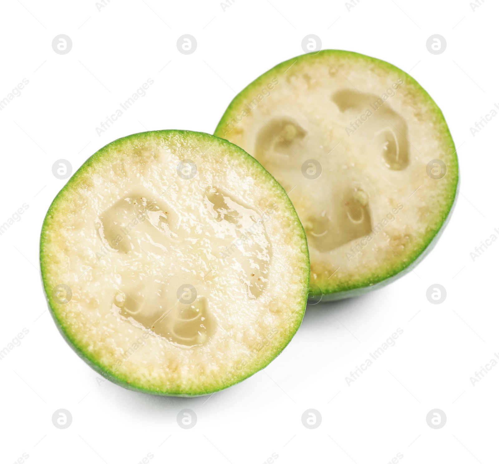 Photo of Halves of feijoa fruit on white background