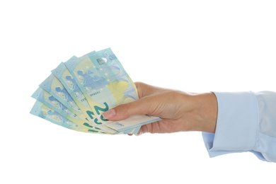 Woman with Euro banknotes on white background, closeup