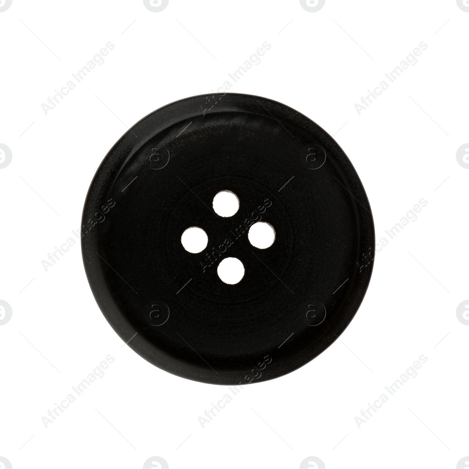 Photo of Black plastic sewing button isolated on white