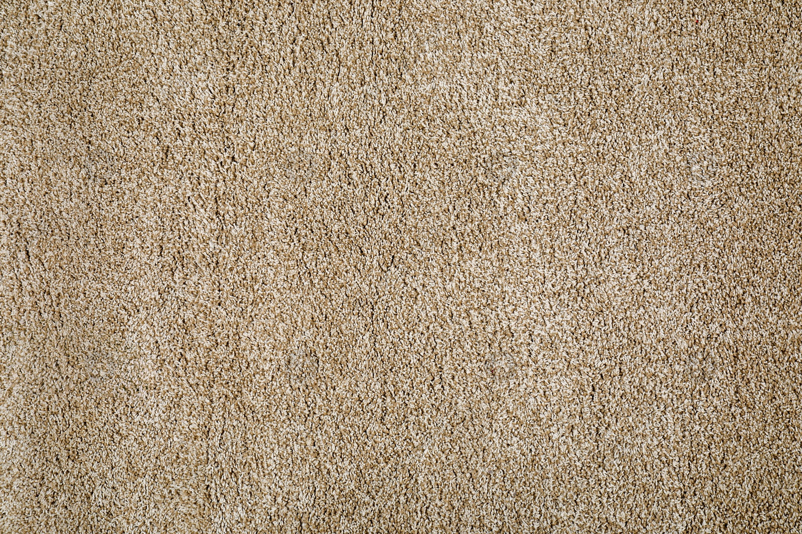 Photo of Stylish soft beige carpet as background, top view