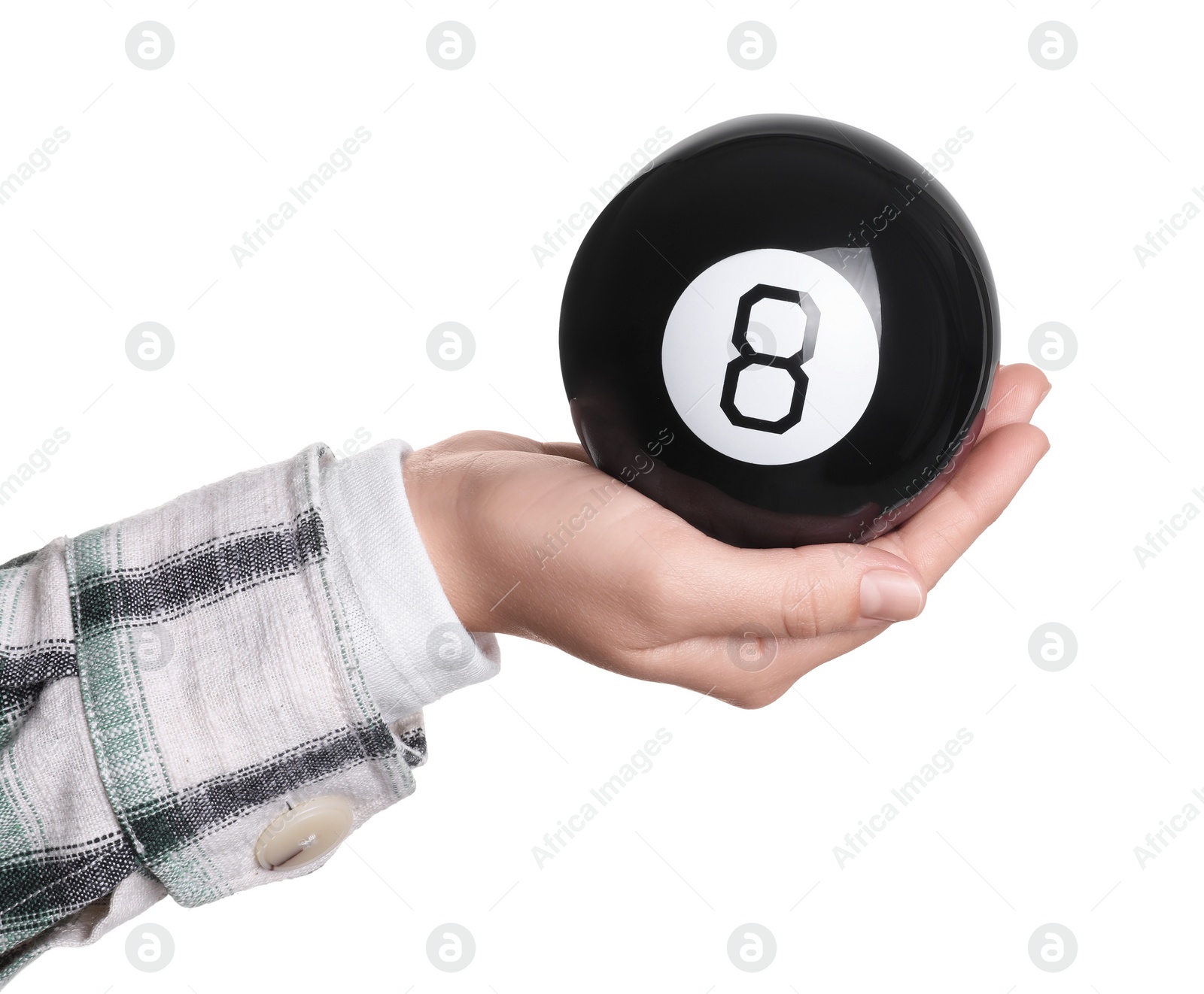 Photo of Woman holding magic eight ball on white background, closeup