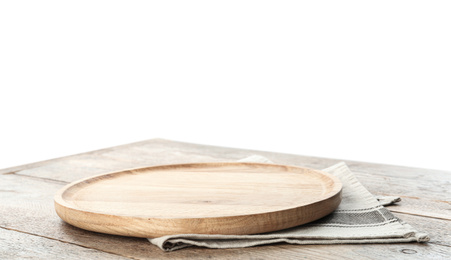 Photo of Empty plate and napkin on wooden table against white background