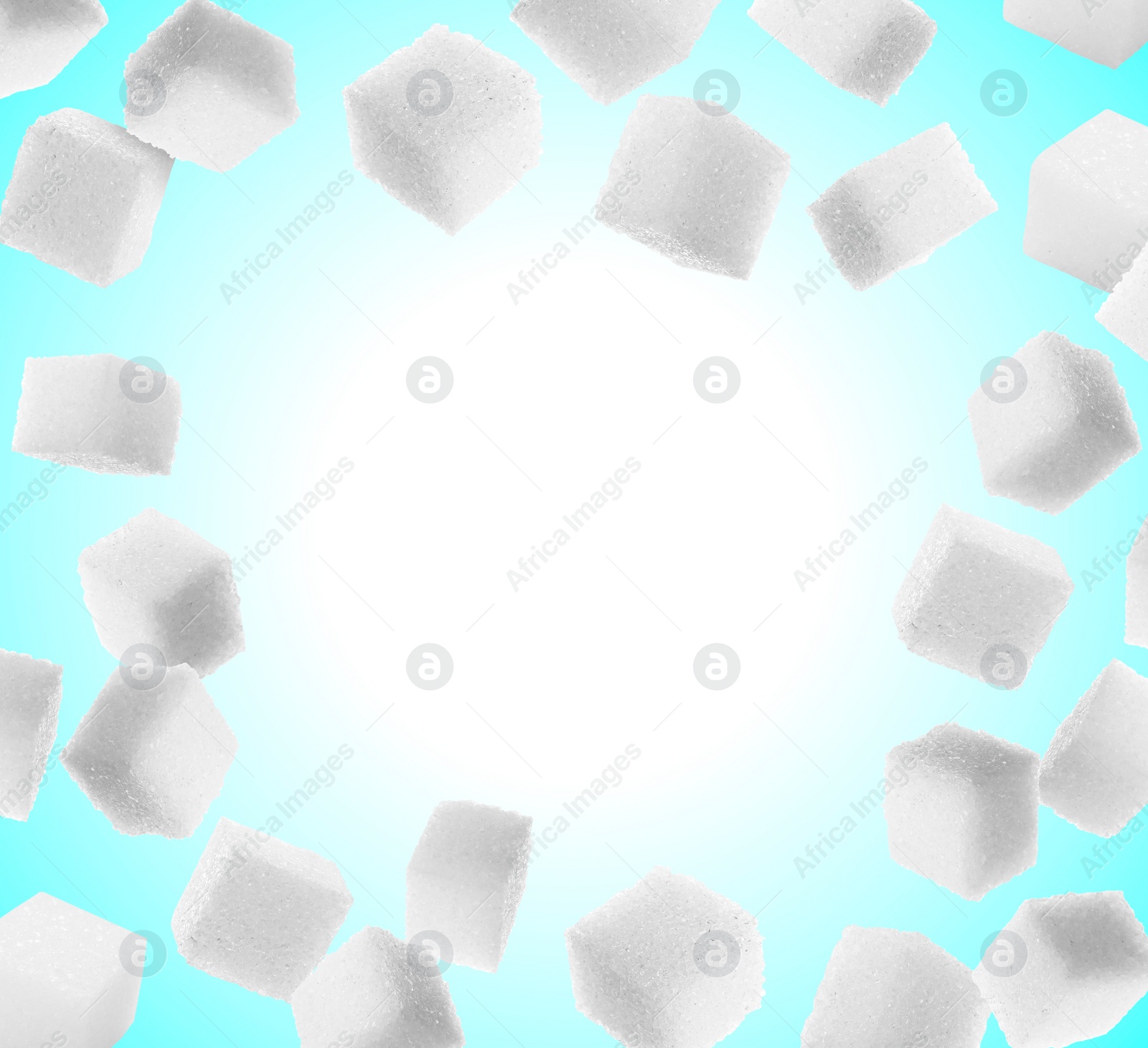 Image of Refined sugar cubes in air on light blue gradient background. Space for text