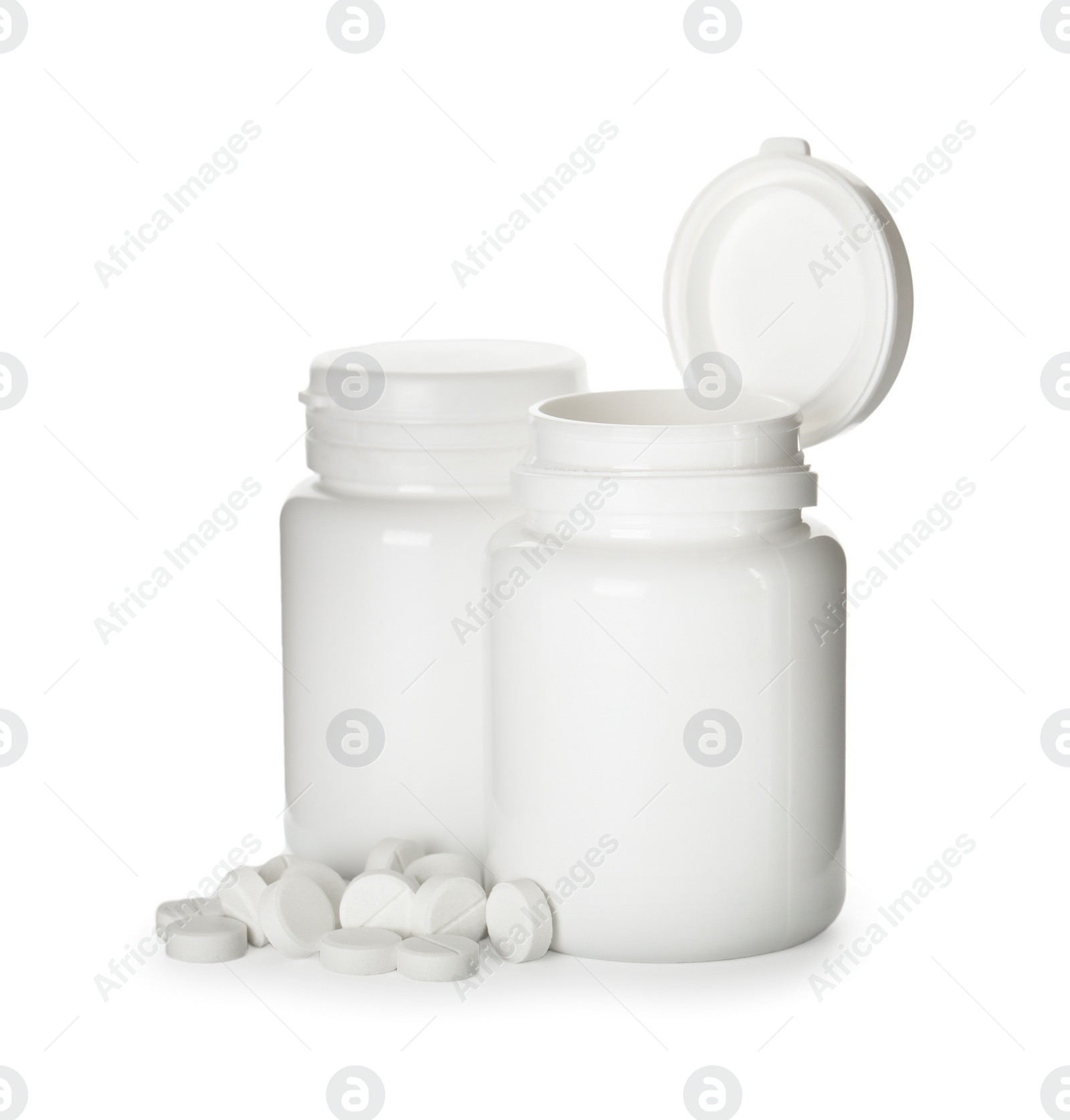 Photo of Plastic bottles with pills on white background