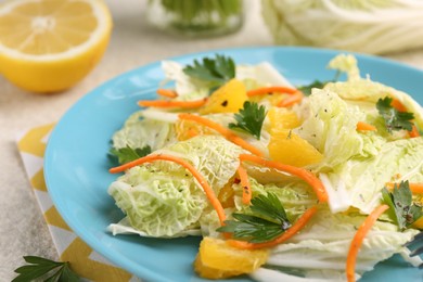 Photo of Tasty salad with Chinese cabbage on table, closeup