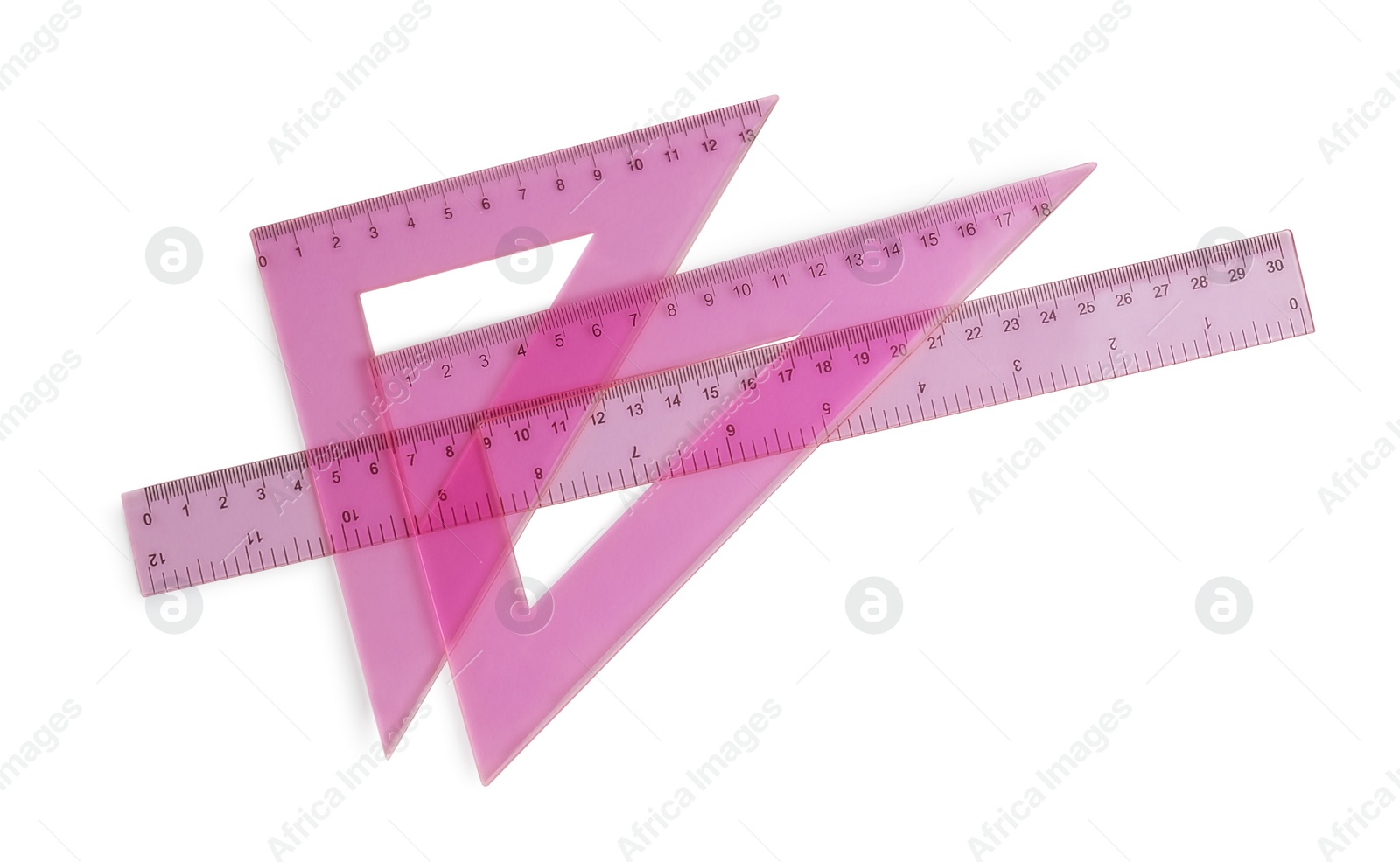 Photo of Triangles with measuring length markings and ruler isolated on white, top view